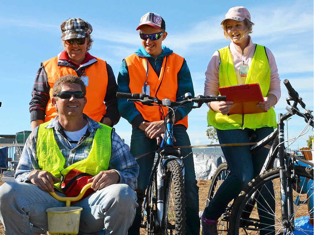 THINGS GREAT AND SMALL: Allora show society volunteers Tracey, Terry and Kayla Heslin try out the bikes on auction while dad Matthew Heslin opts for something a little different. THINGS GREAT AND SMALL: Allora show society volunteers Tracey, Terry and Kayla Heslin try out the bikes on auction while dad Matthew Heslin opts for something a little different.